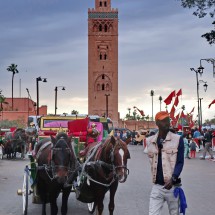 77 meters high Minaret tower of the Koutoubia mosque (built in the 12th century) seen from Jemaa el-Fnaa